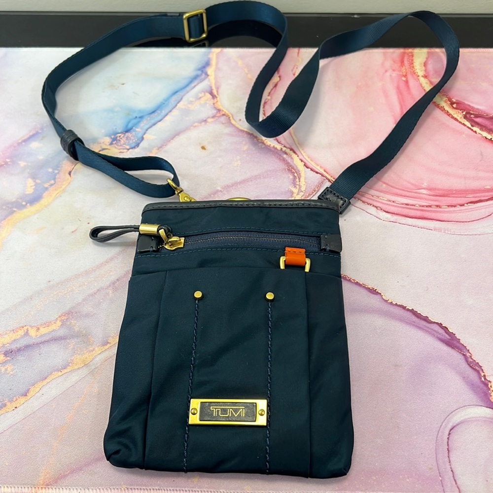 Tumi navy blue crossbody bag